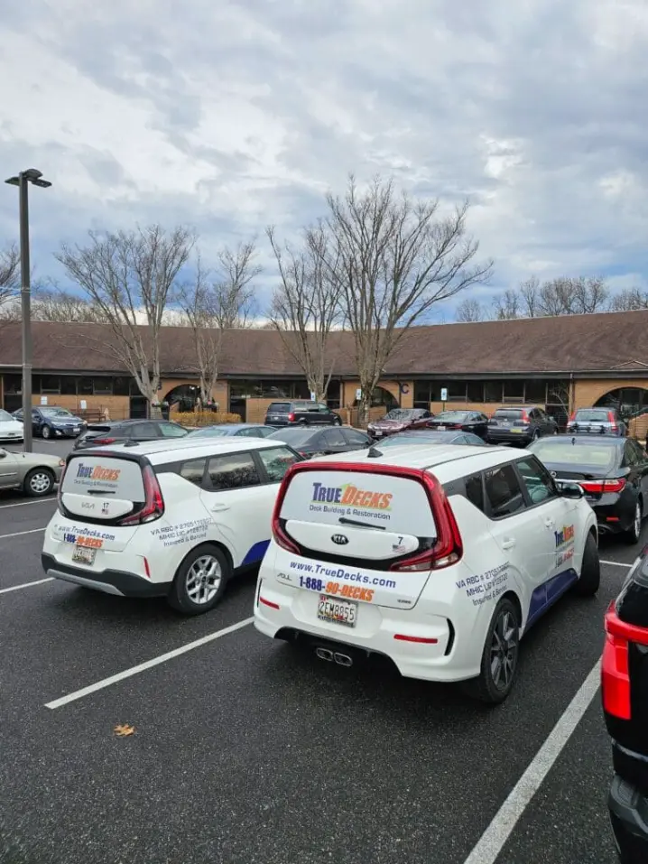 two Trudecks service vans parked at a service locaiton
