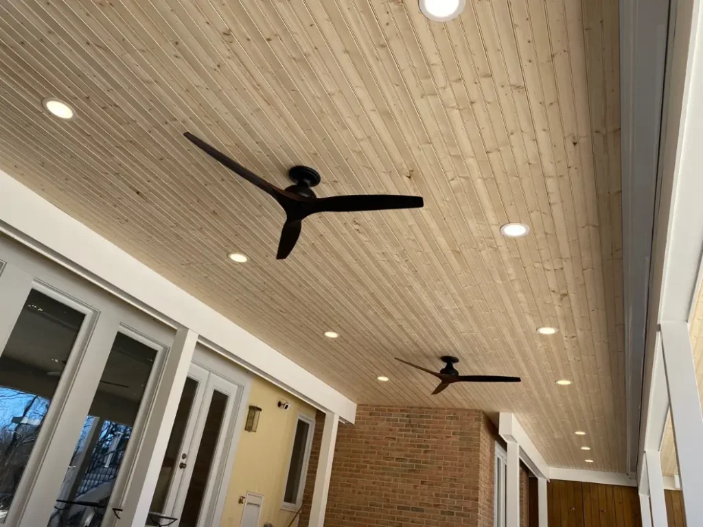 A ceiling fan installed on a home's ceiling, providing ventilation and aesthetic appeal to the living space.
