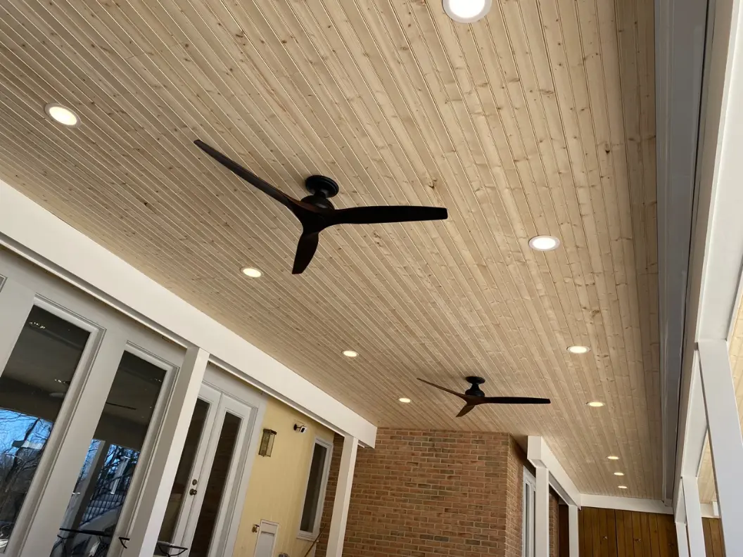A ceiling fan installed on a home's ceiling, providing ventilation and aesthetic appeal to the living space.